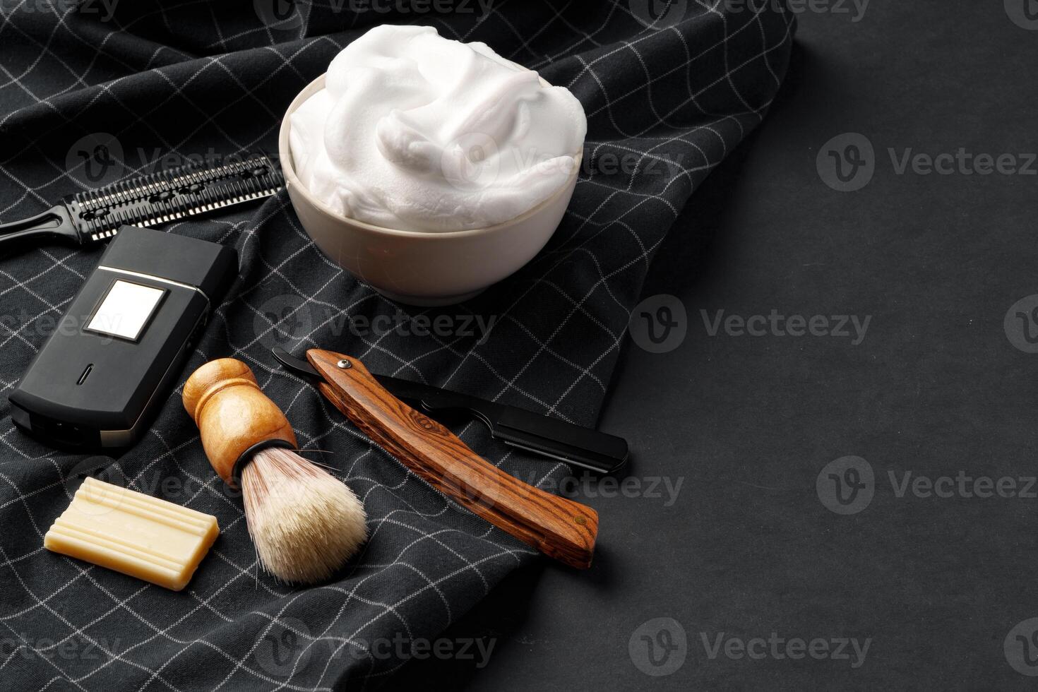 Traditional Wet Shaving Gear Arranged on a Dark Background With Morning Light photo