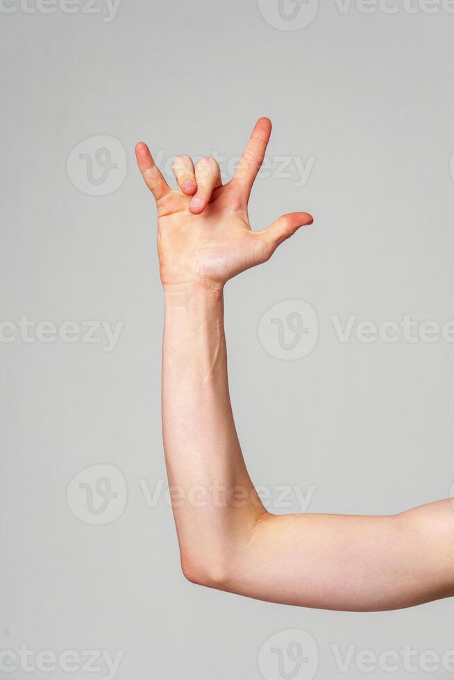 Person With Hand Raised in the Air photo