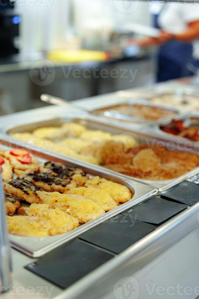 Variety of Food Displayed on Buffet Table photo