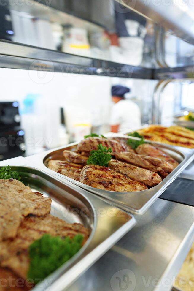 Variety of Food Displayed on Buffet Table photo