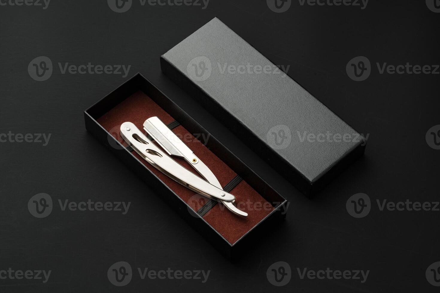 Barber shaving blade on black background close up photo