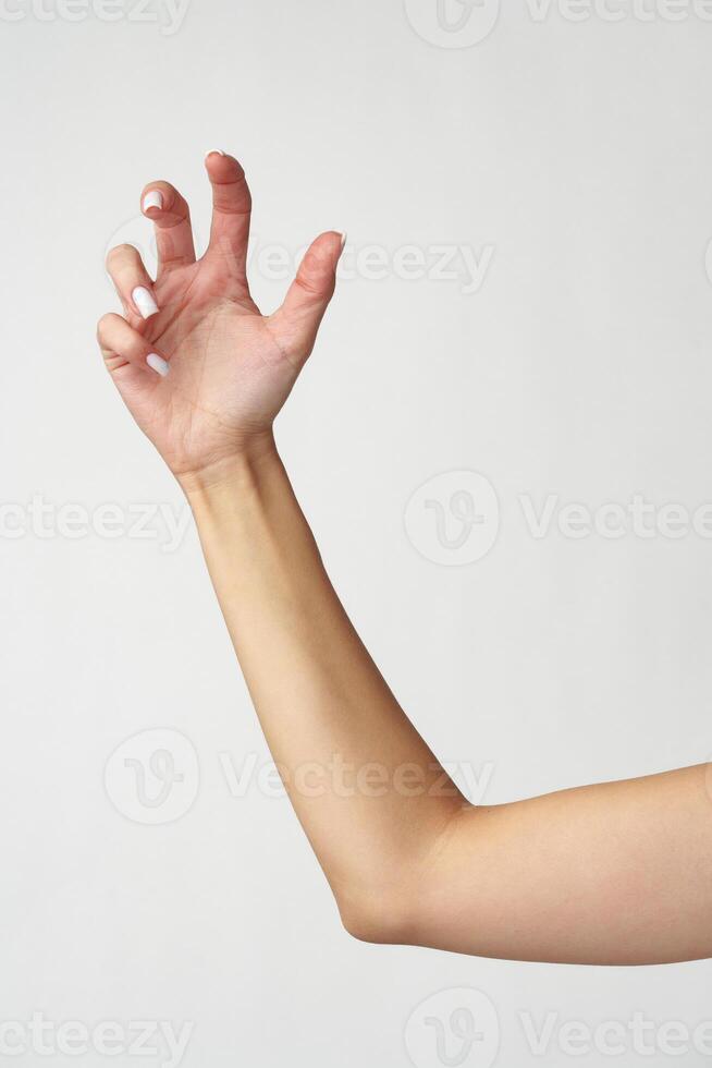 Female hand on white background close up photo