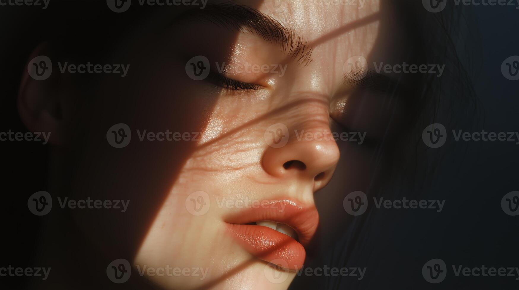 Soft sunlight filters through shadows as a young woman relaxes, capturing a serene moment of quiet reflection indoors photo