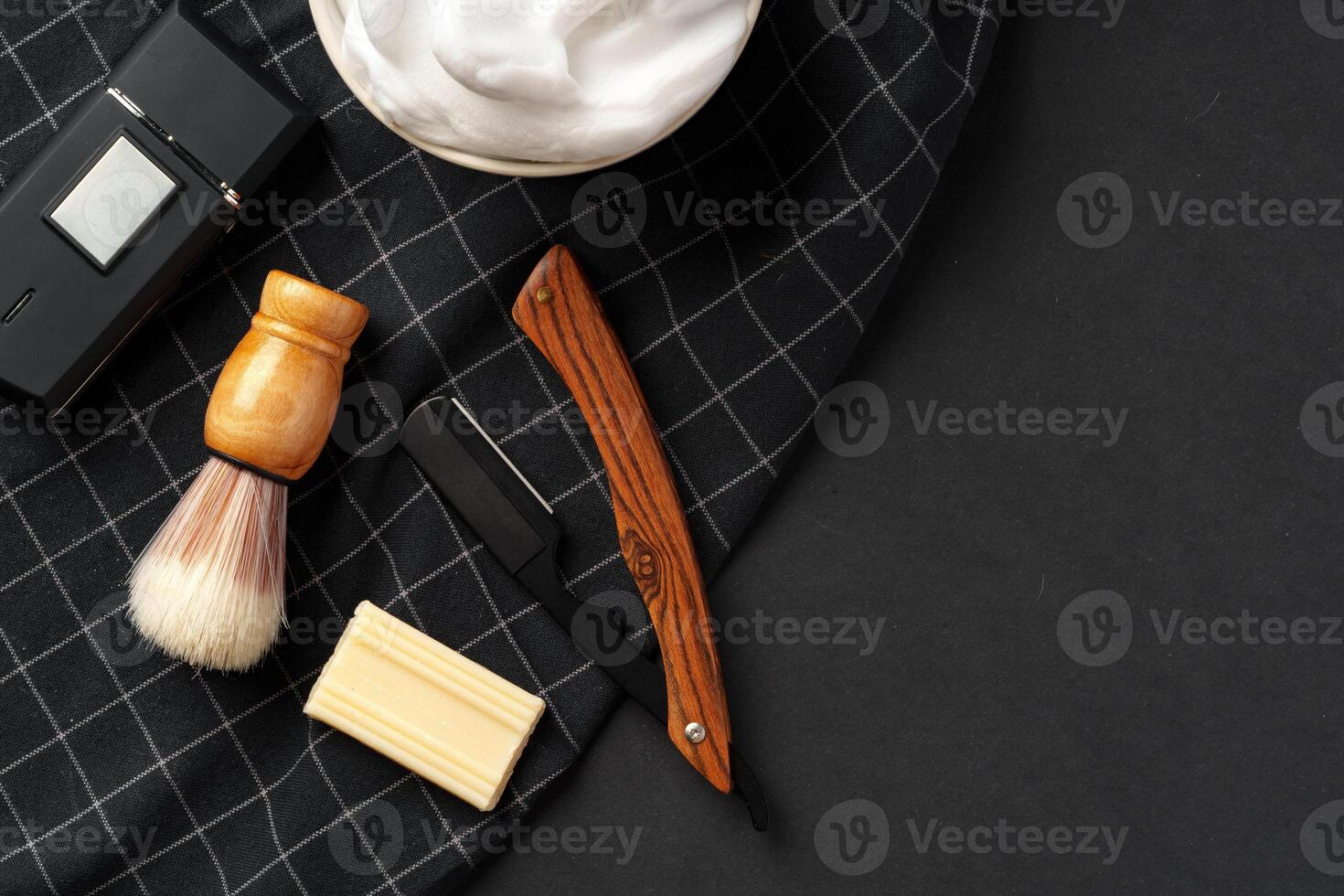 Traditional Wet Shaving Gear Arranged on a Dark Background With Morning Light photo