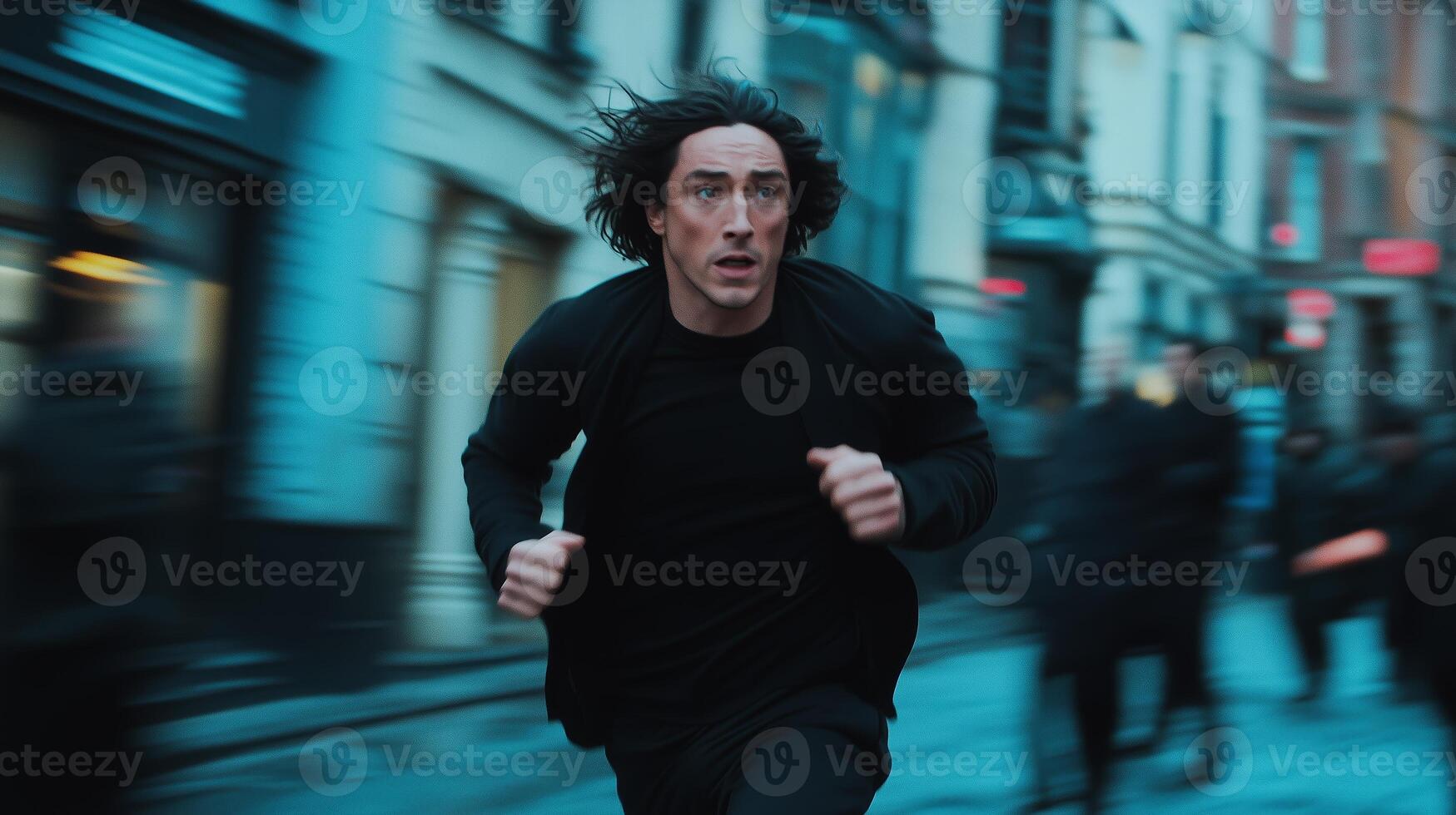 A man running through a city street in a hurry during a rainy evening, showcasing urgency and determination in a blurred urban environment photo