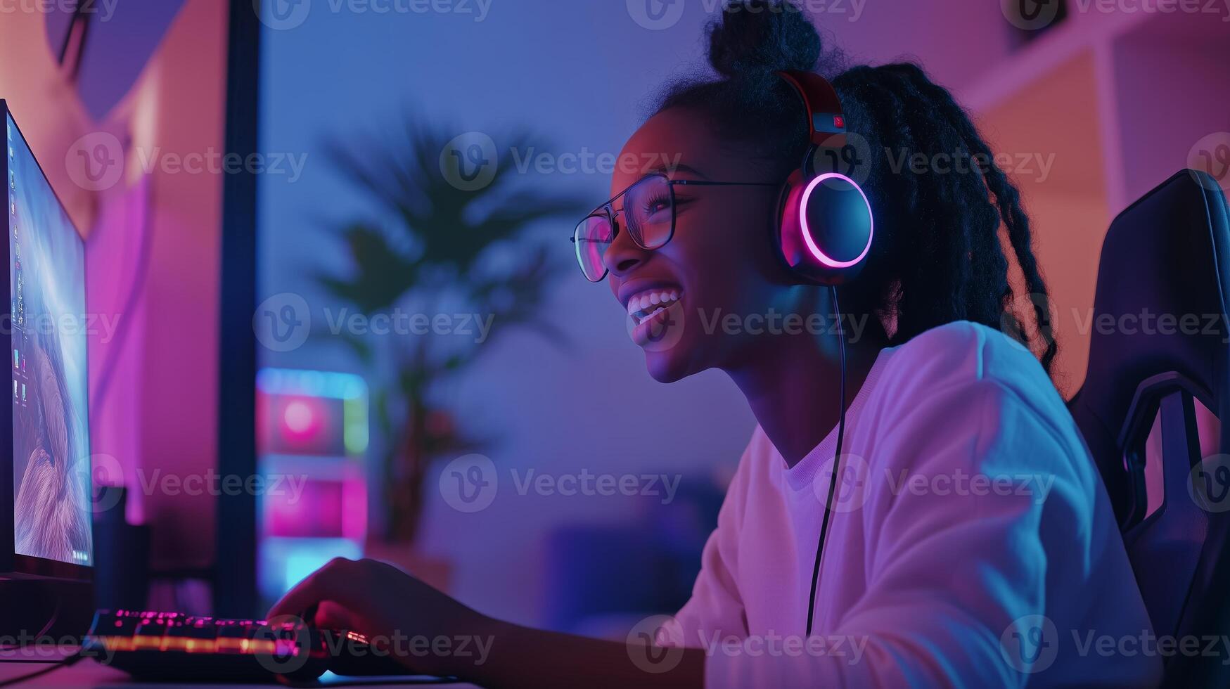 Young gamer enjoying an immersive experience in a colorful gaming setup at home during the evening hours photo