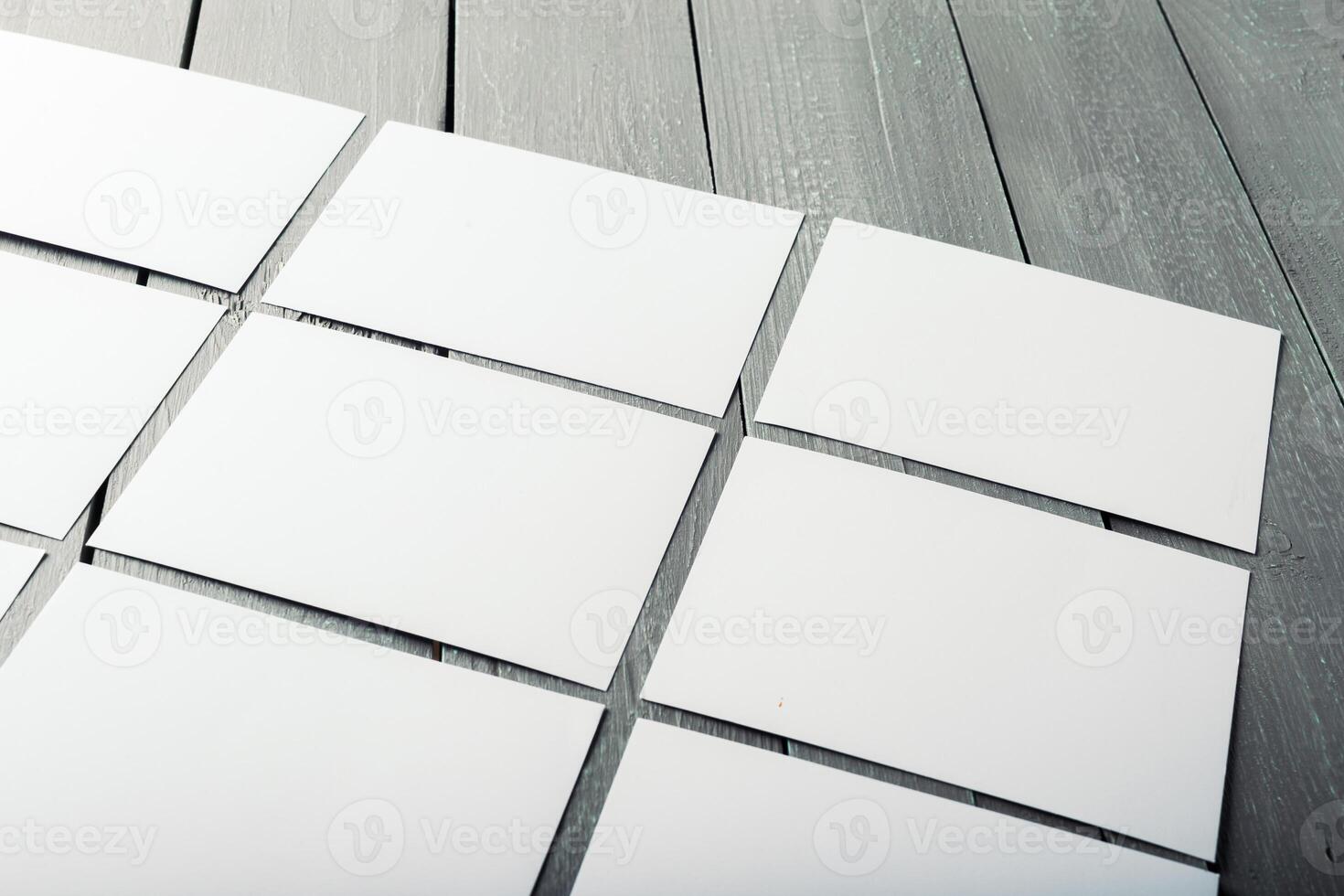 blank business cards on a wooden background photo