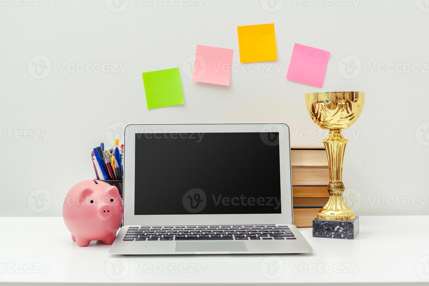 Work place of a creative person with a variety of colorful stationery objects photo