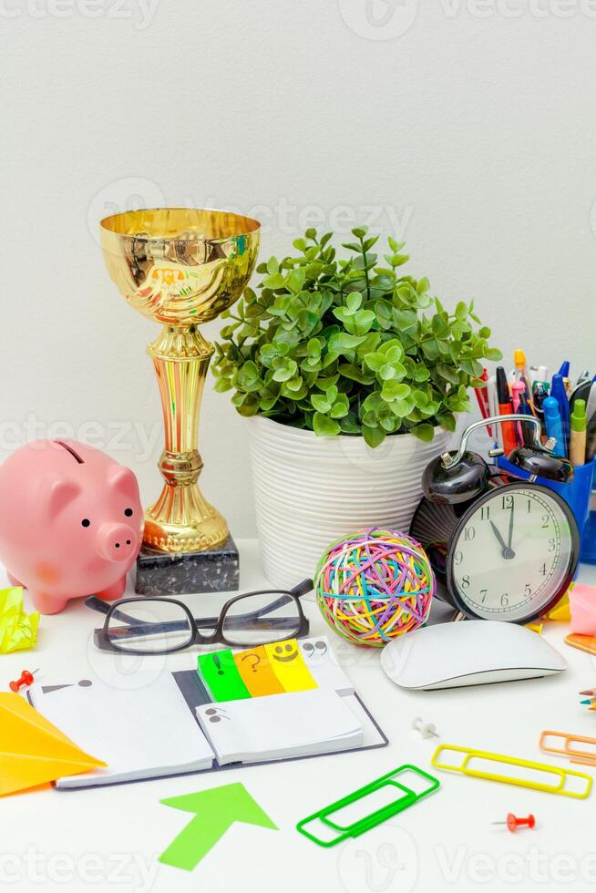 Work place of a creative person with a variety of colorful stationery objects photo