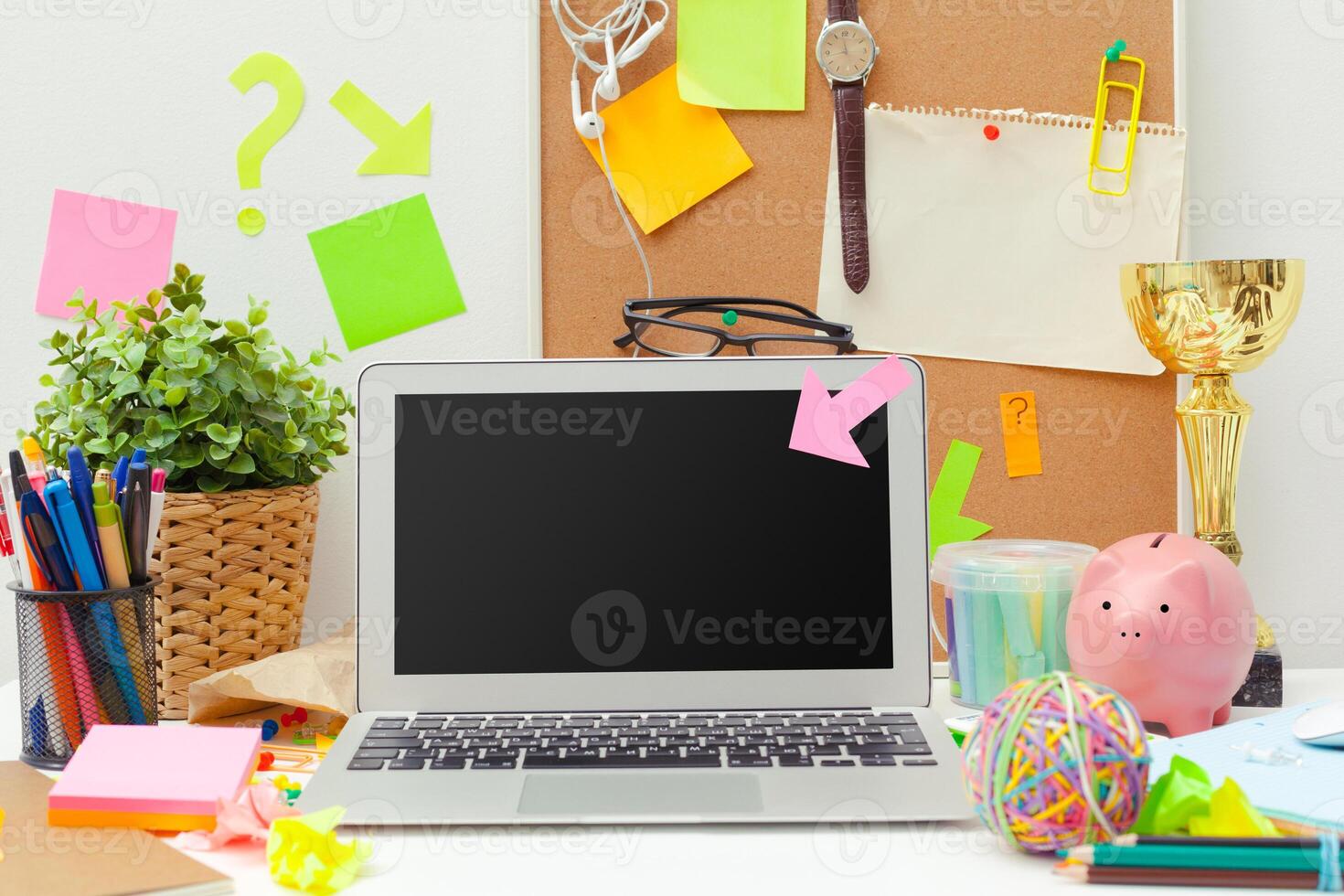 Work place of a creative person with a variety of colorful stationery objects photo