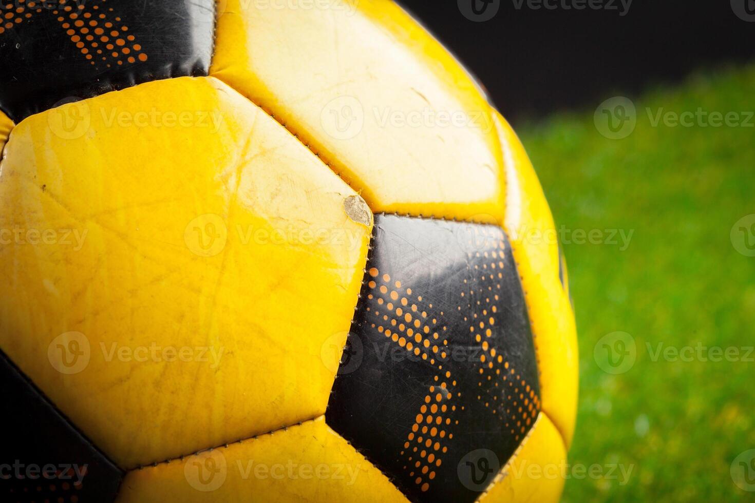 soccer ball on the green field photo