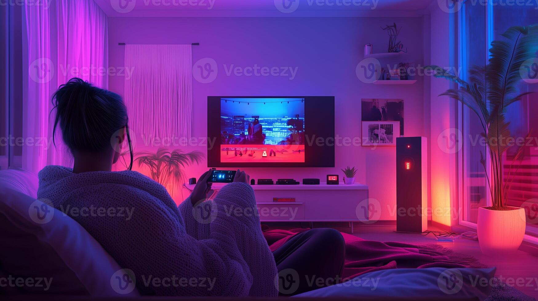 Cozy evening at home with soft lighting while relaxing on the couch and watching a movie on the TV photo