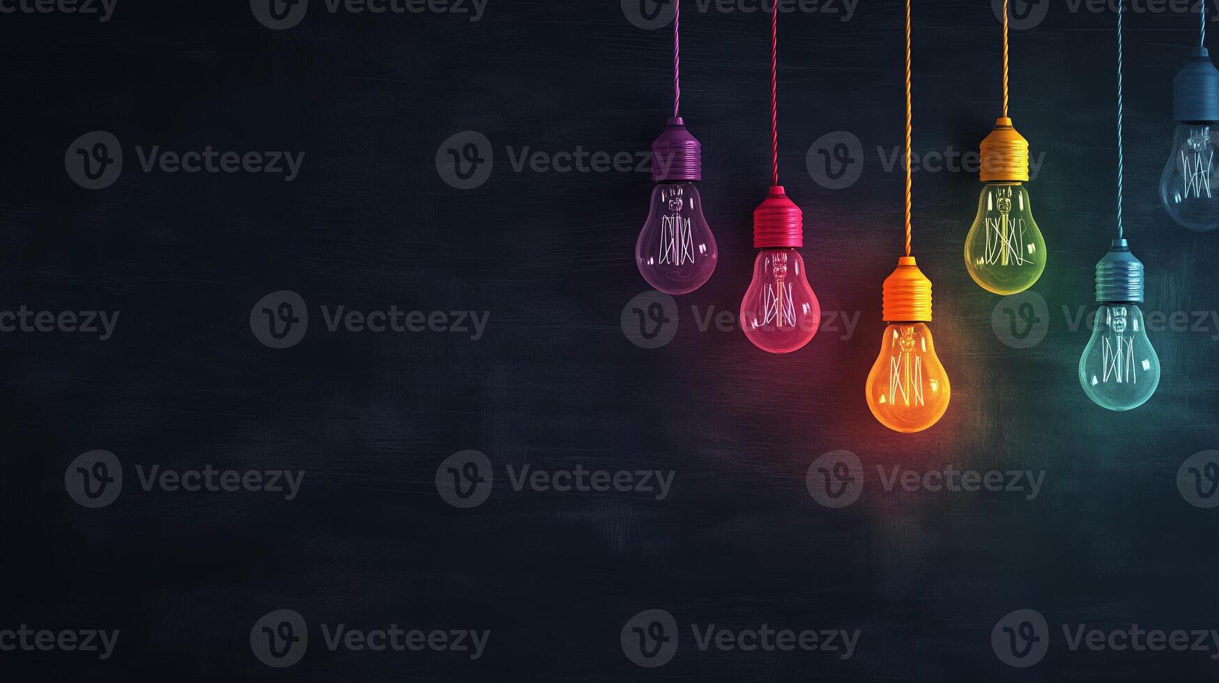 A vibrant display of colorful hanging light bulbs against a dark background creating a modern aesthetic in indoor decor photo