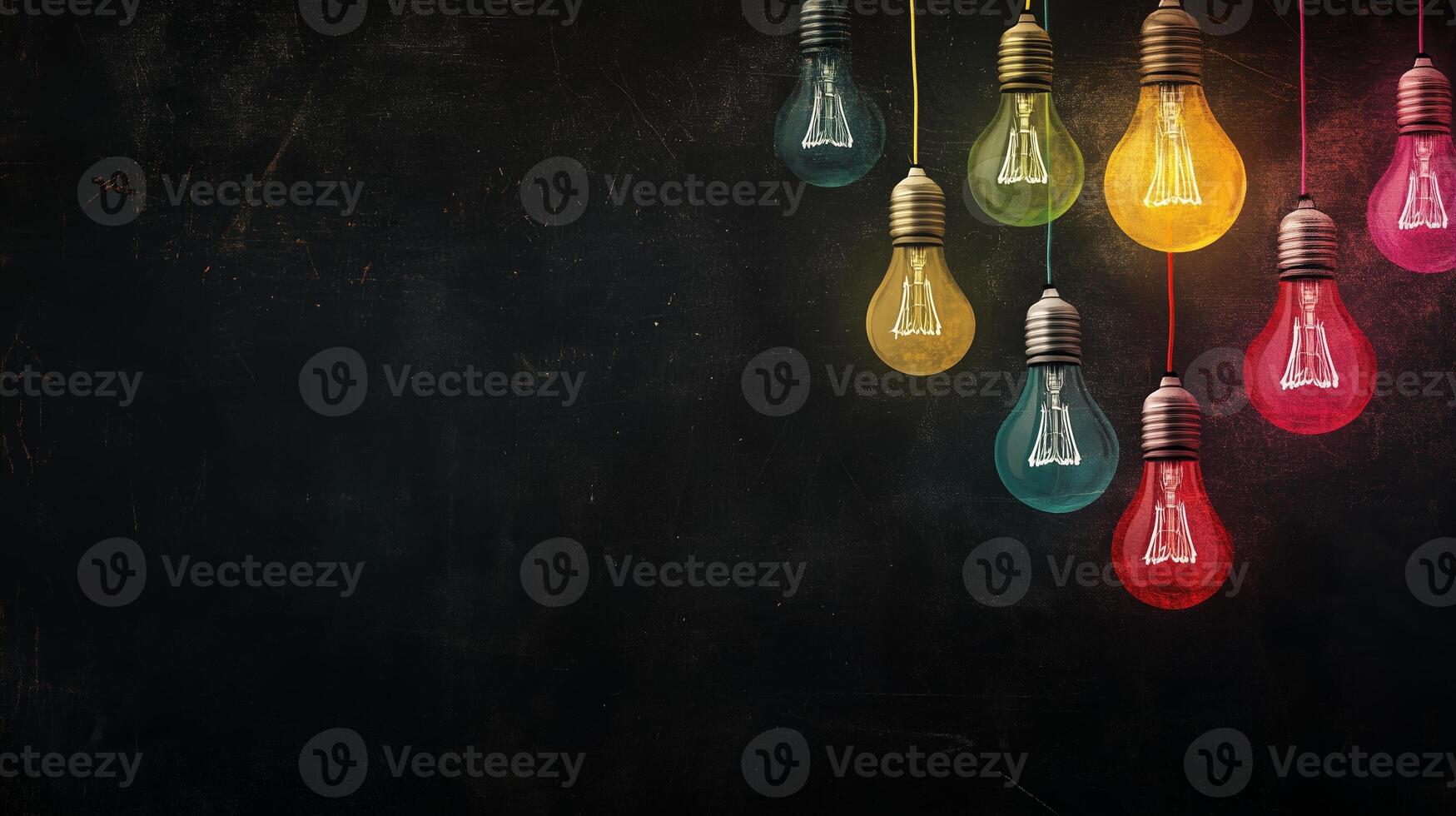 Colorful hanging light bulbs illuminating a dark background in a creative design setting photo