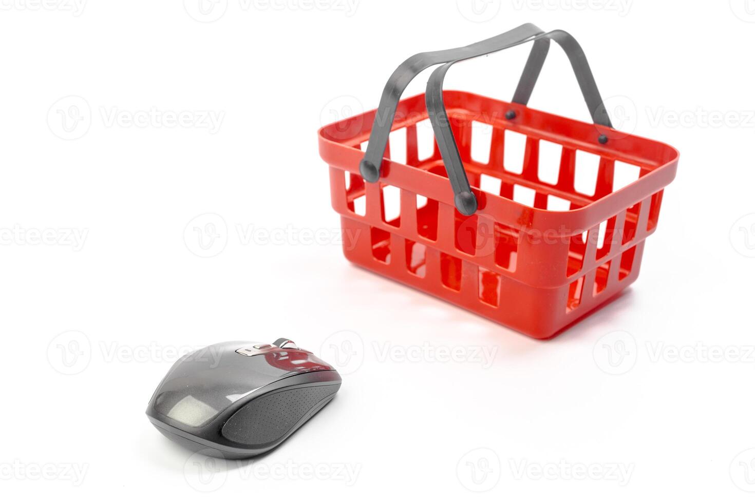 Internet shopping concept. Computer mouse and shopping cart photo