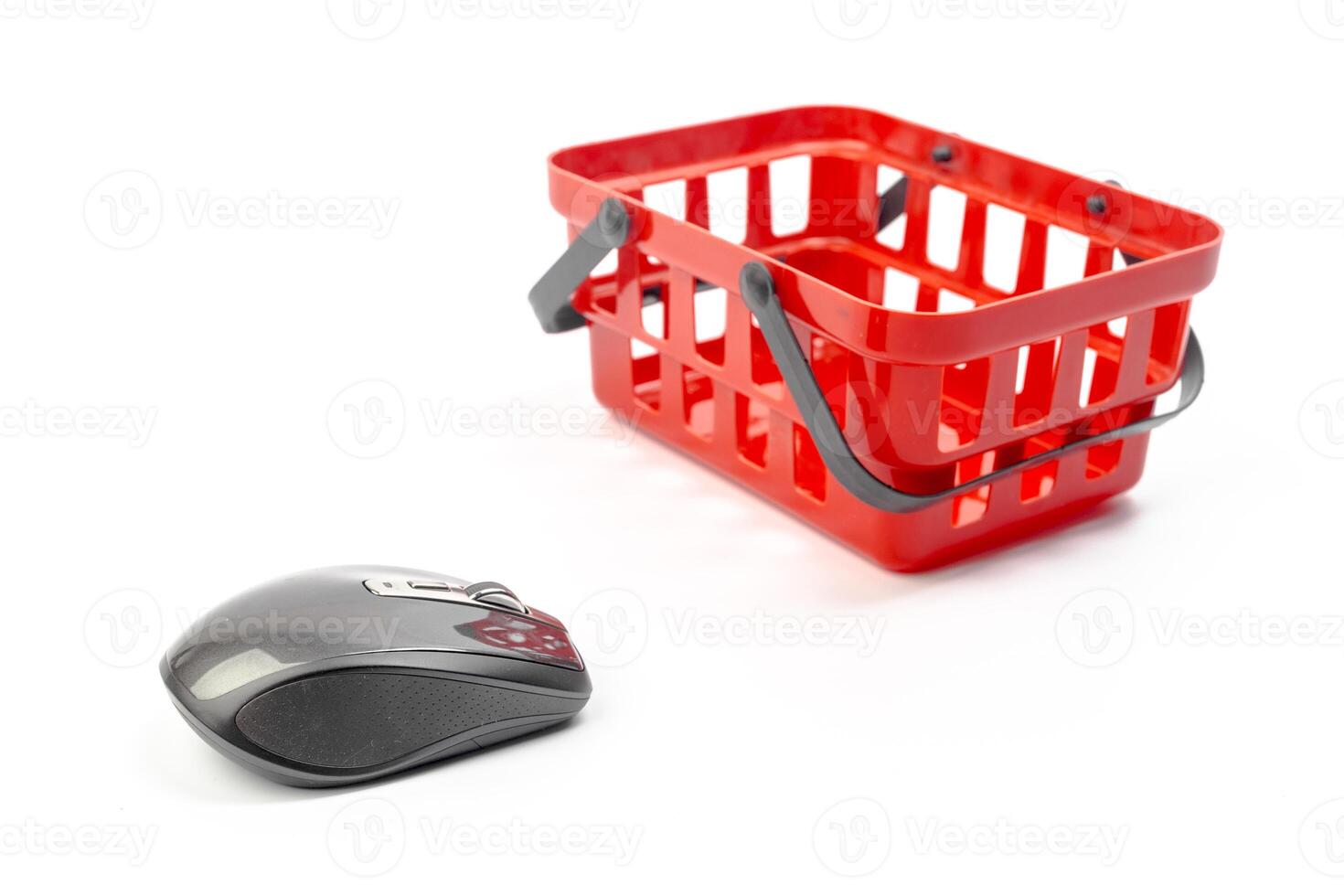 Internet shopping concept. Computer mouse and shopping cart photo