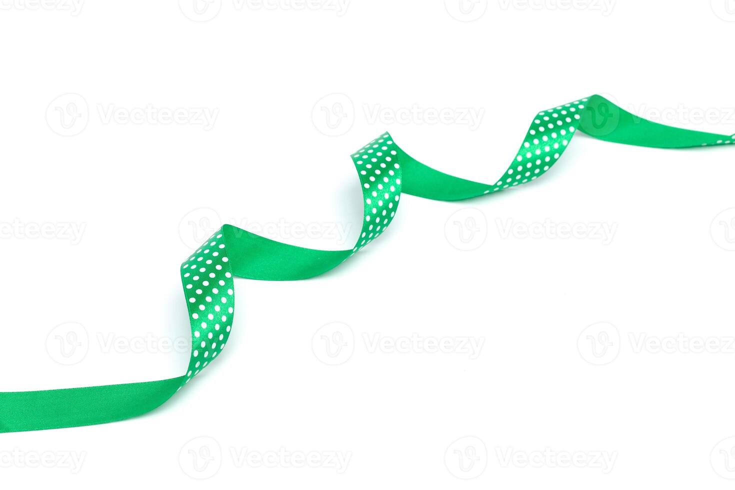 a green ribbon isolated on white background photo