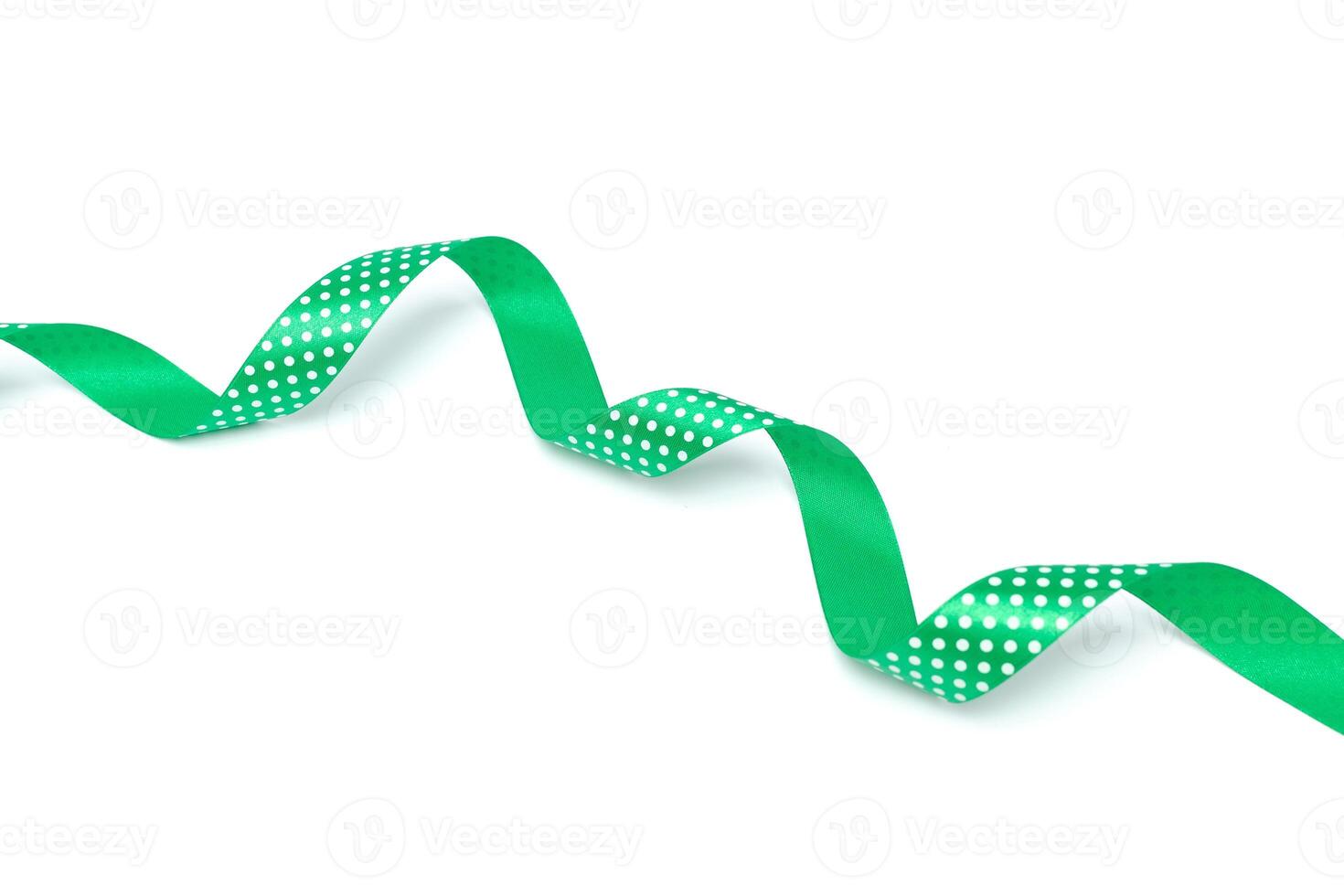 a green ribbon isolated on white background photo