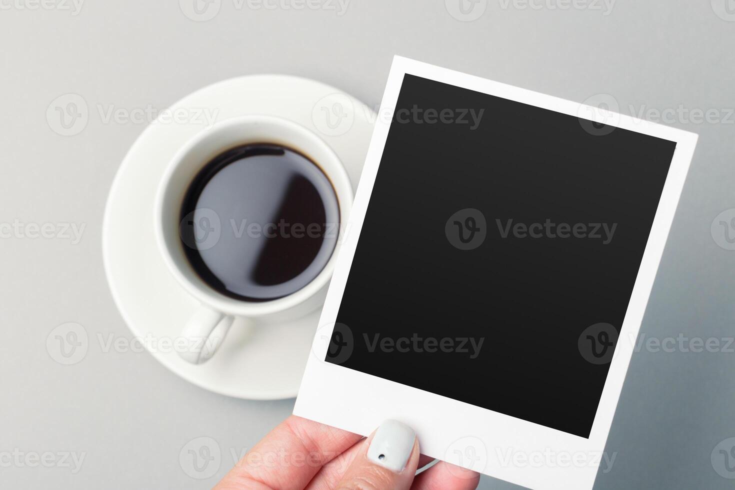 smartphone and coffee on the table photo