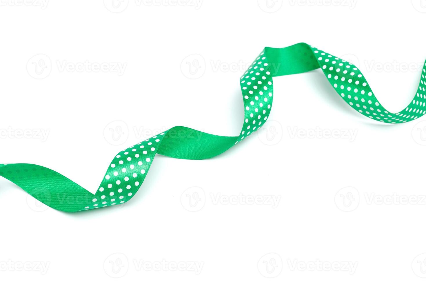 a green ribbon isolated on white background photo
