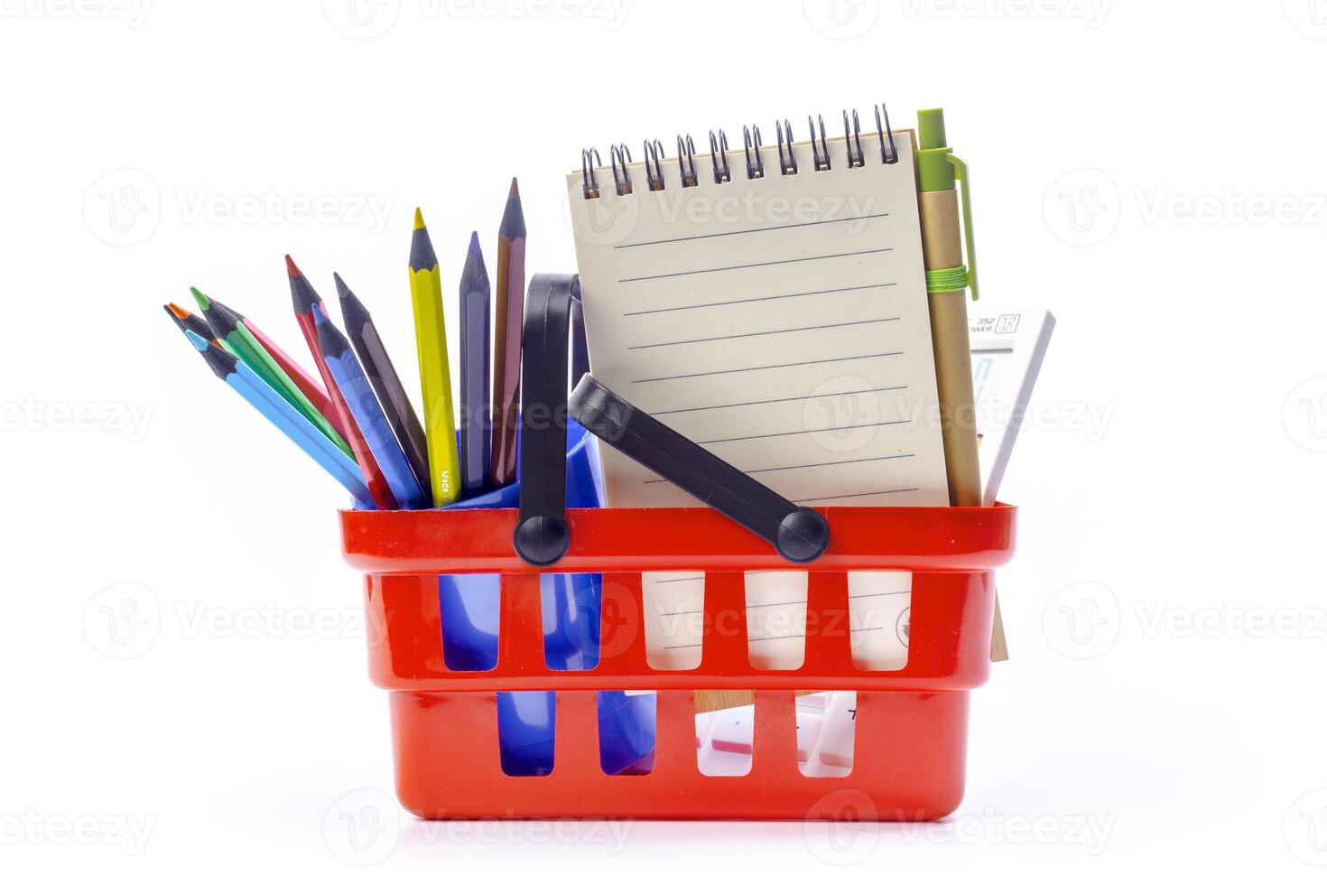 Multiple office tools in a shopping cart, isolated on white background photo