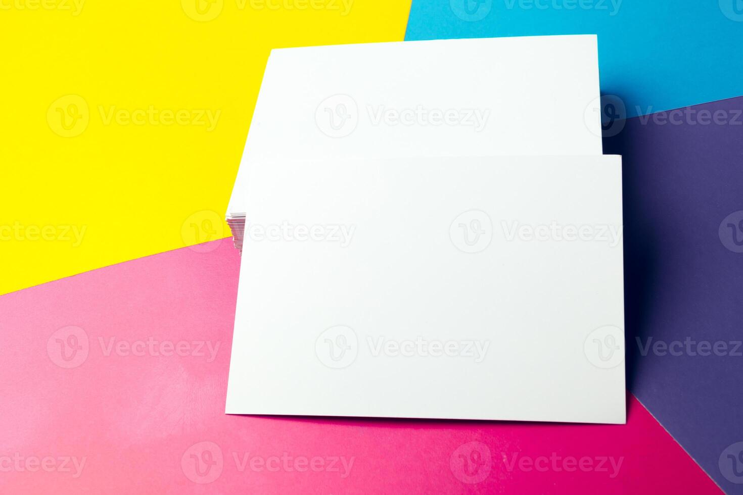 Business card blank over colorful abstract background. photo