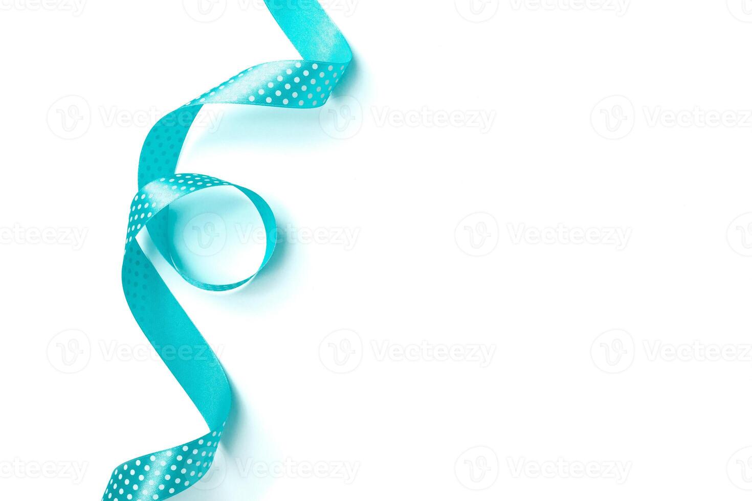 Shiny blue ribbon isolated on white photo