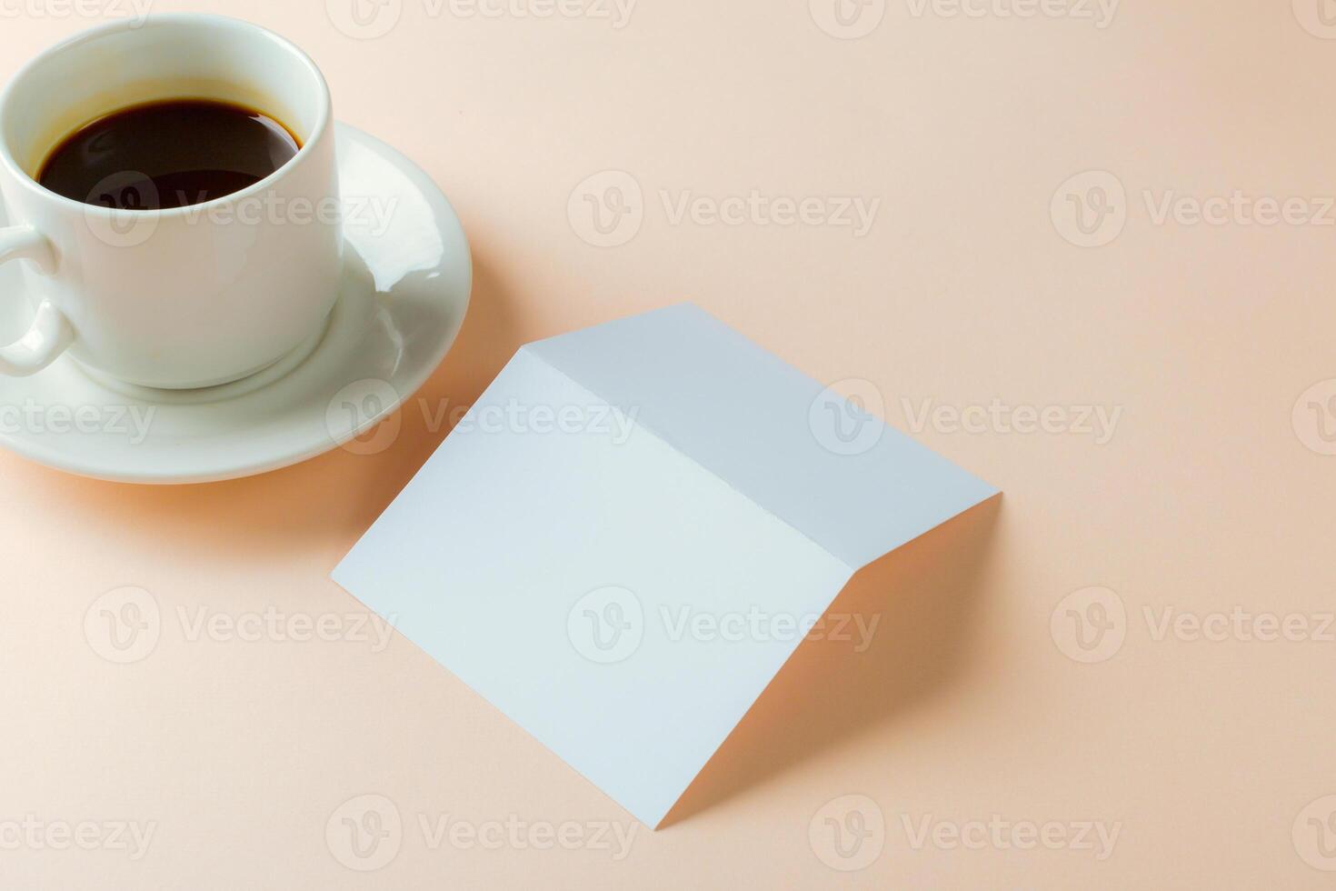 Blank card with coffee cup with space photo