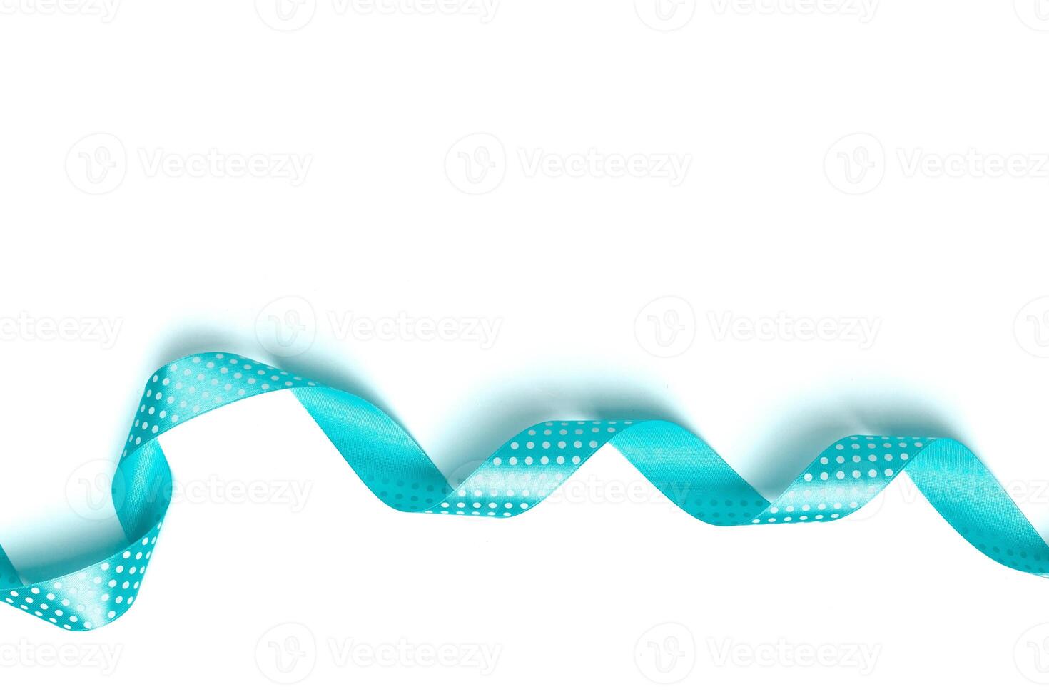 Shiny blue ribbon isolated on white photo