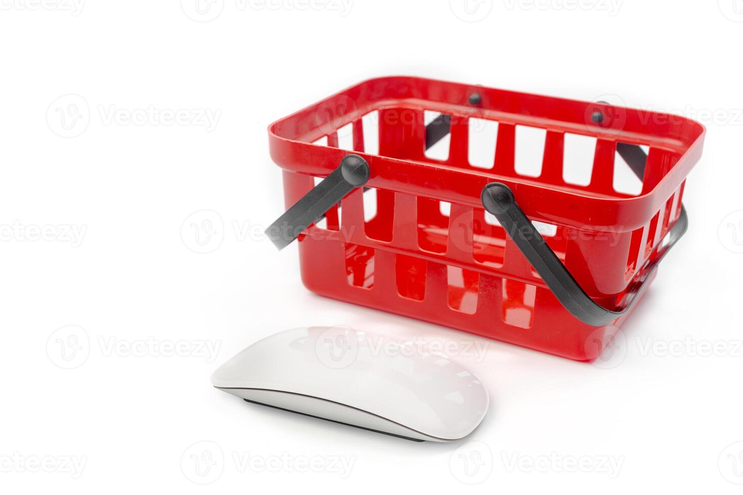 Internet shopping concept. Computer mouse and shopping cart photo