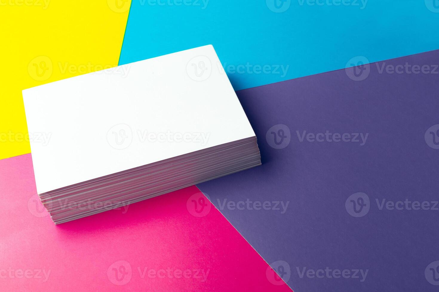Business card blank over colorful abstract background. photo