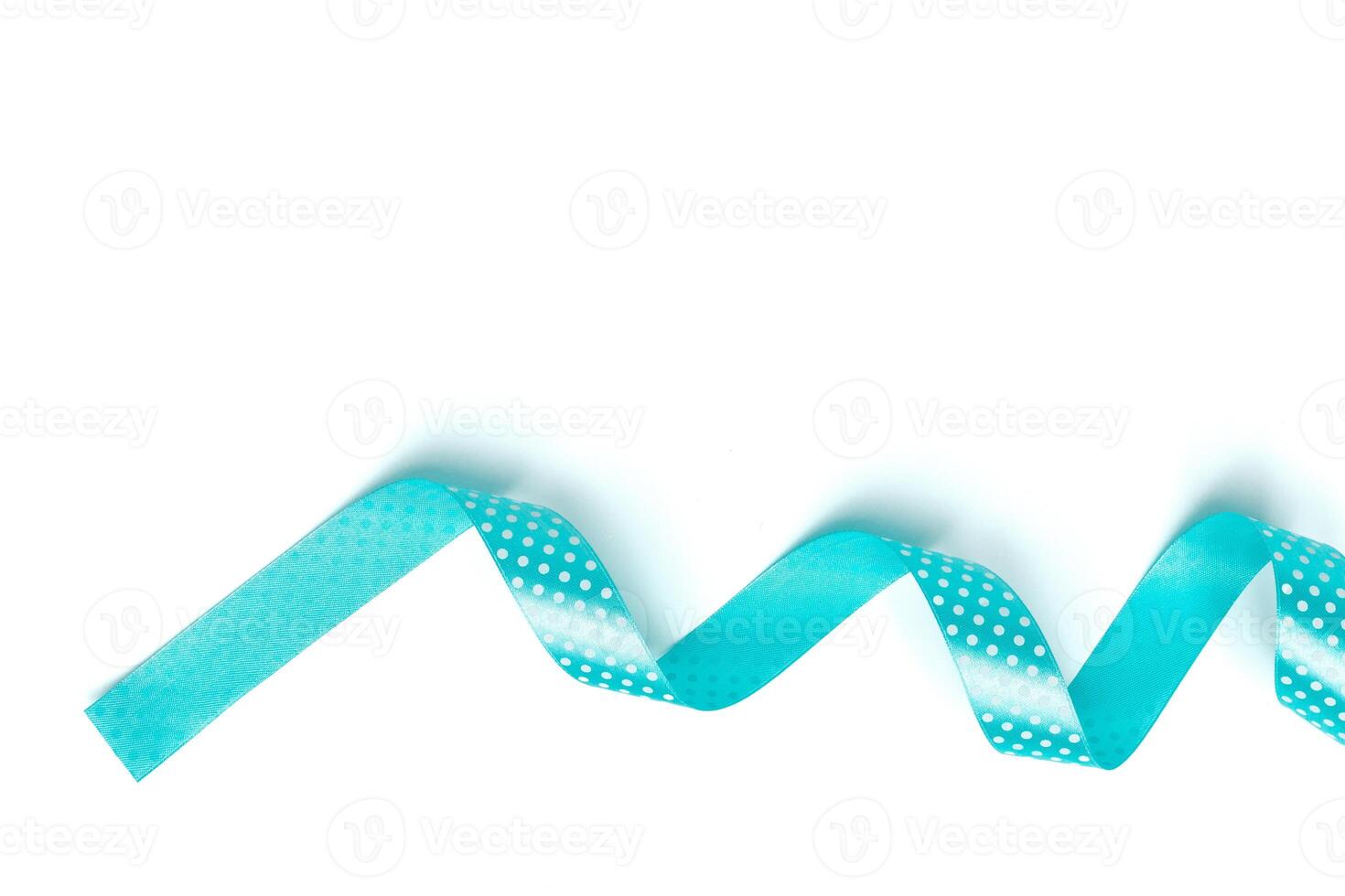 Shiny blue ribbon isolated on white photo