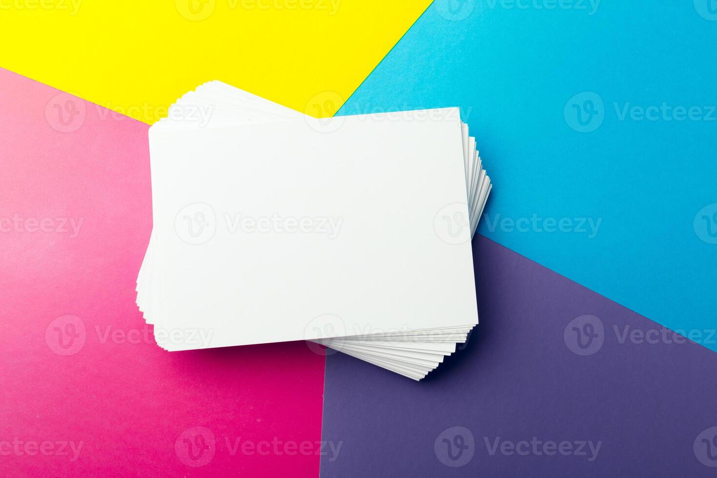 Business card blank over colorful abstract background. photo
