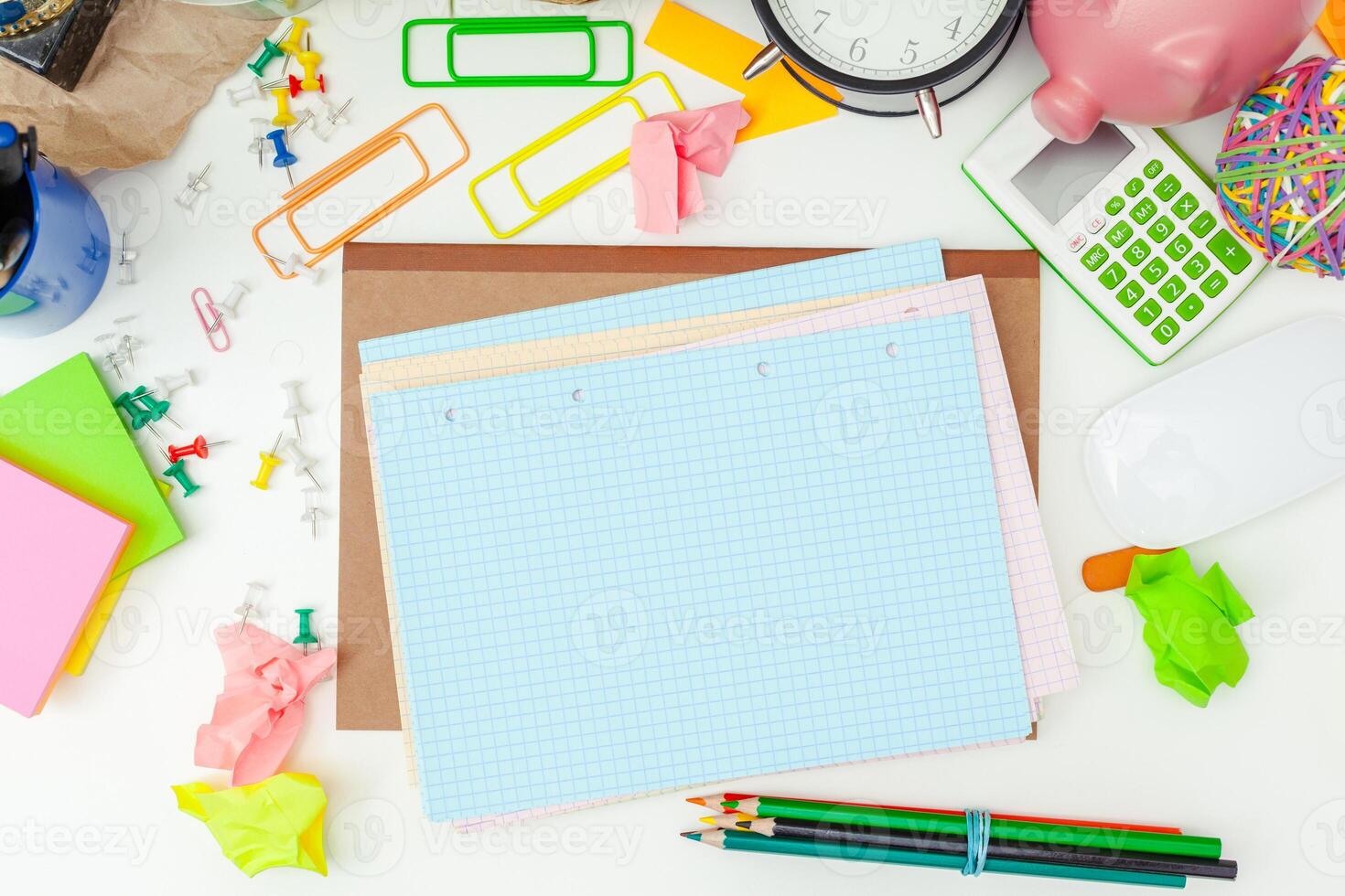 Work place of a creative person with a variety of colorful stationery objects photo