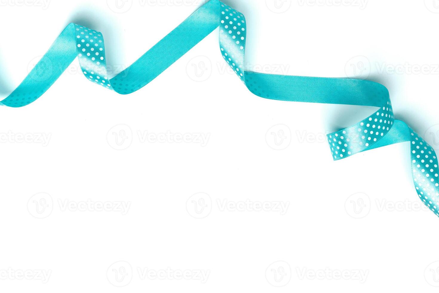 Shiny blue ribbon isolated on white photo