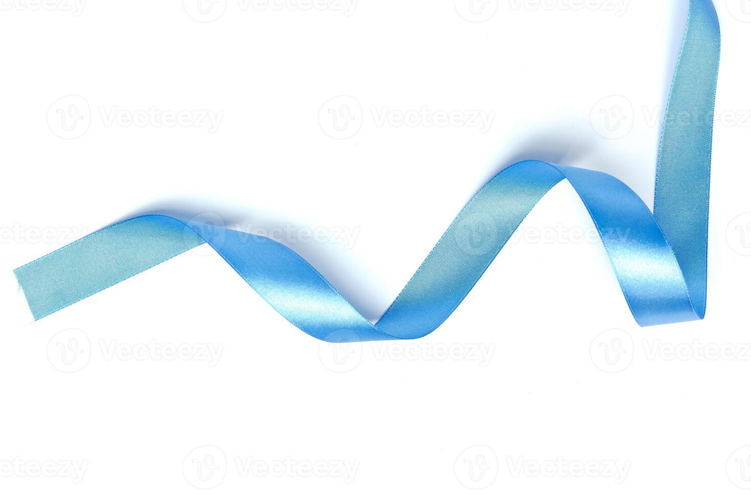 Shiny blue ribbon isolated on white photo