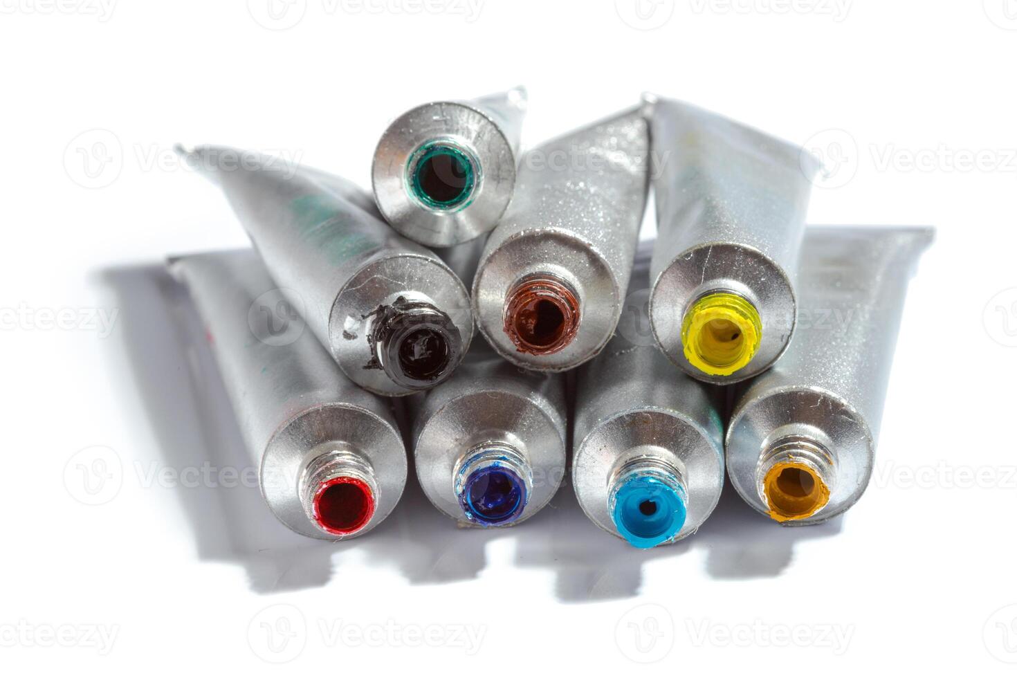paint in tubes isolated on white photo