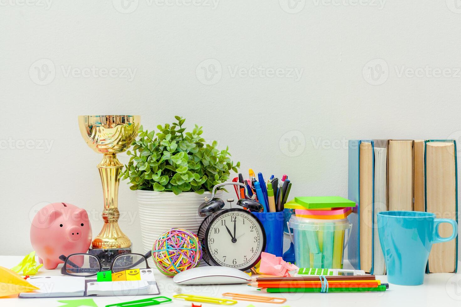 Work place of a creative person with a variety of colorful stationery objects photo