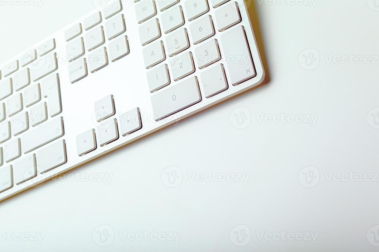 Close up image of computer office keyboard on a white background photo