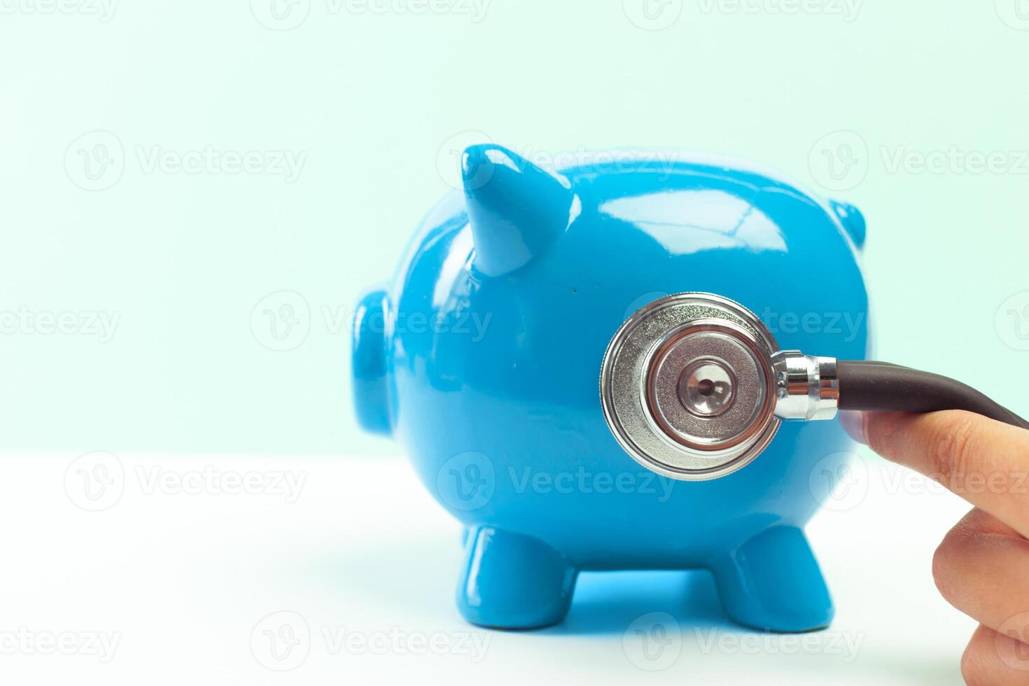 Blue piggy bank or money box photo