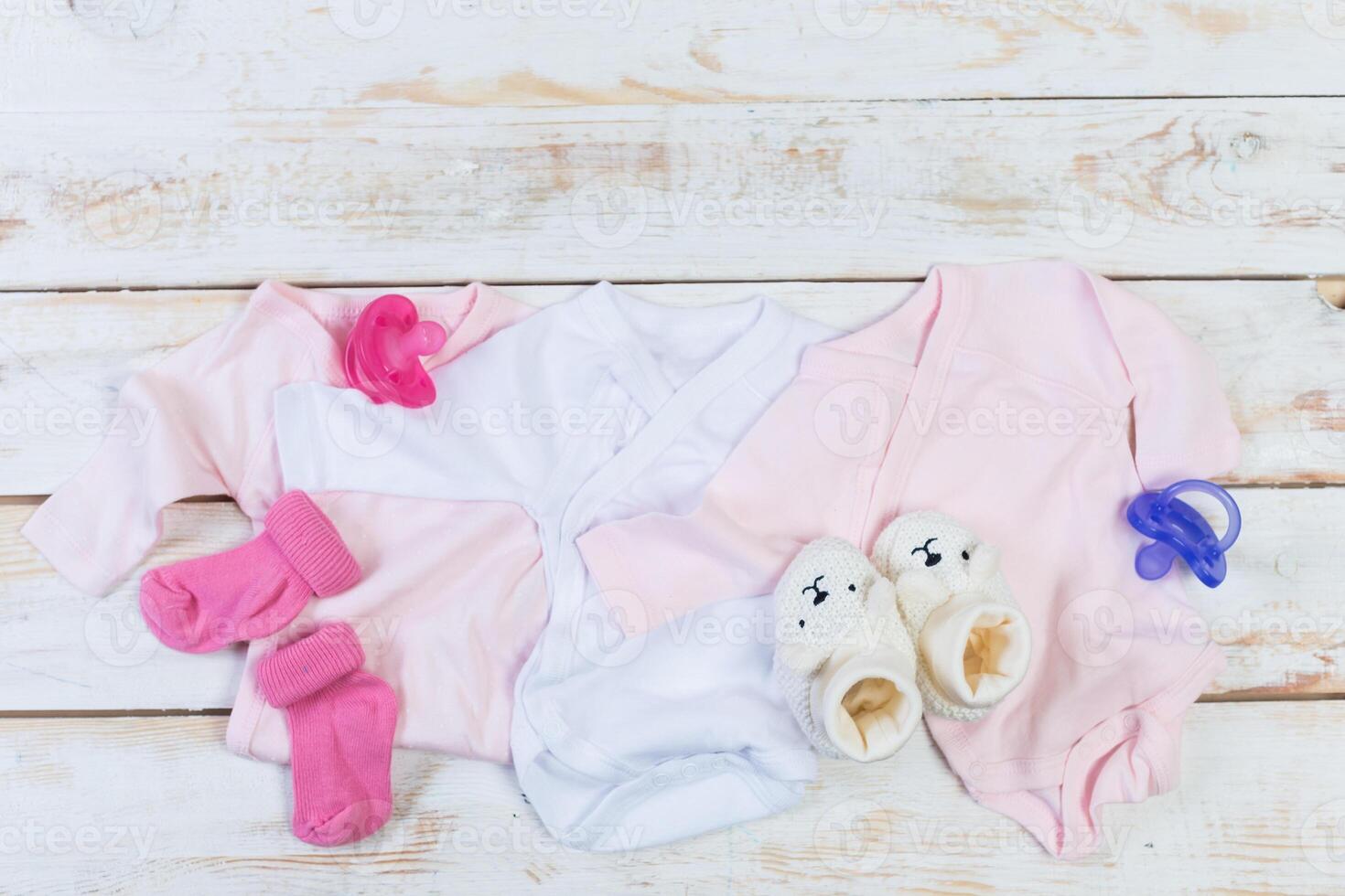set of fashion trendy clothes and kids stuff for little baby girl photo