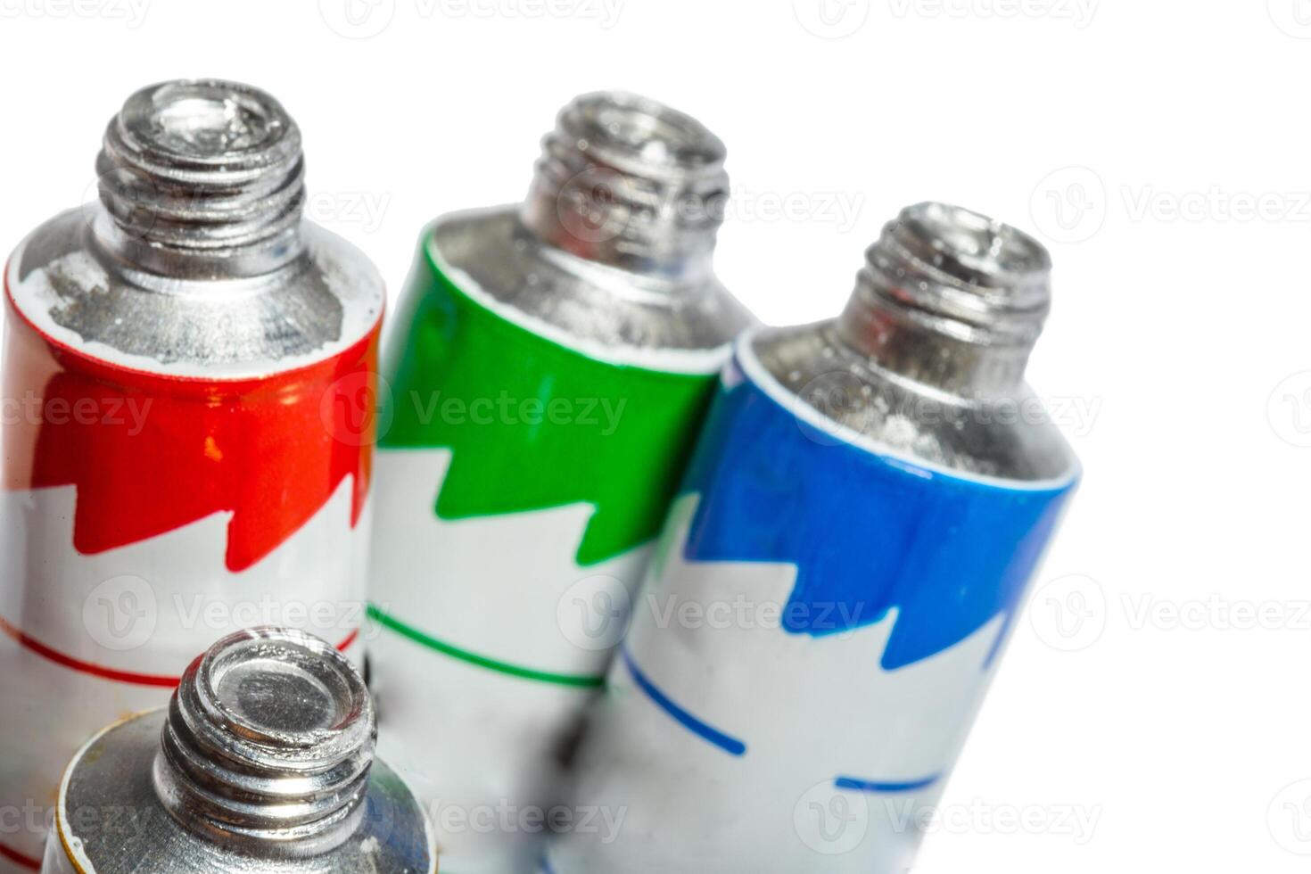 paint in tubes isolated on white photo