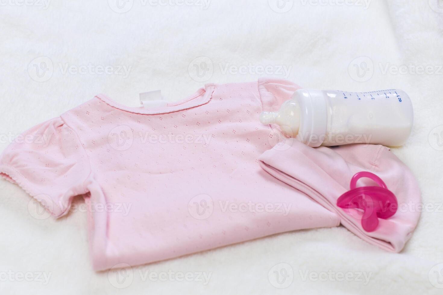 set of fashion trendy clothes and kids stuff for little baby girl photo
