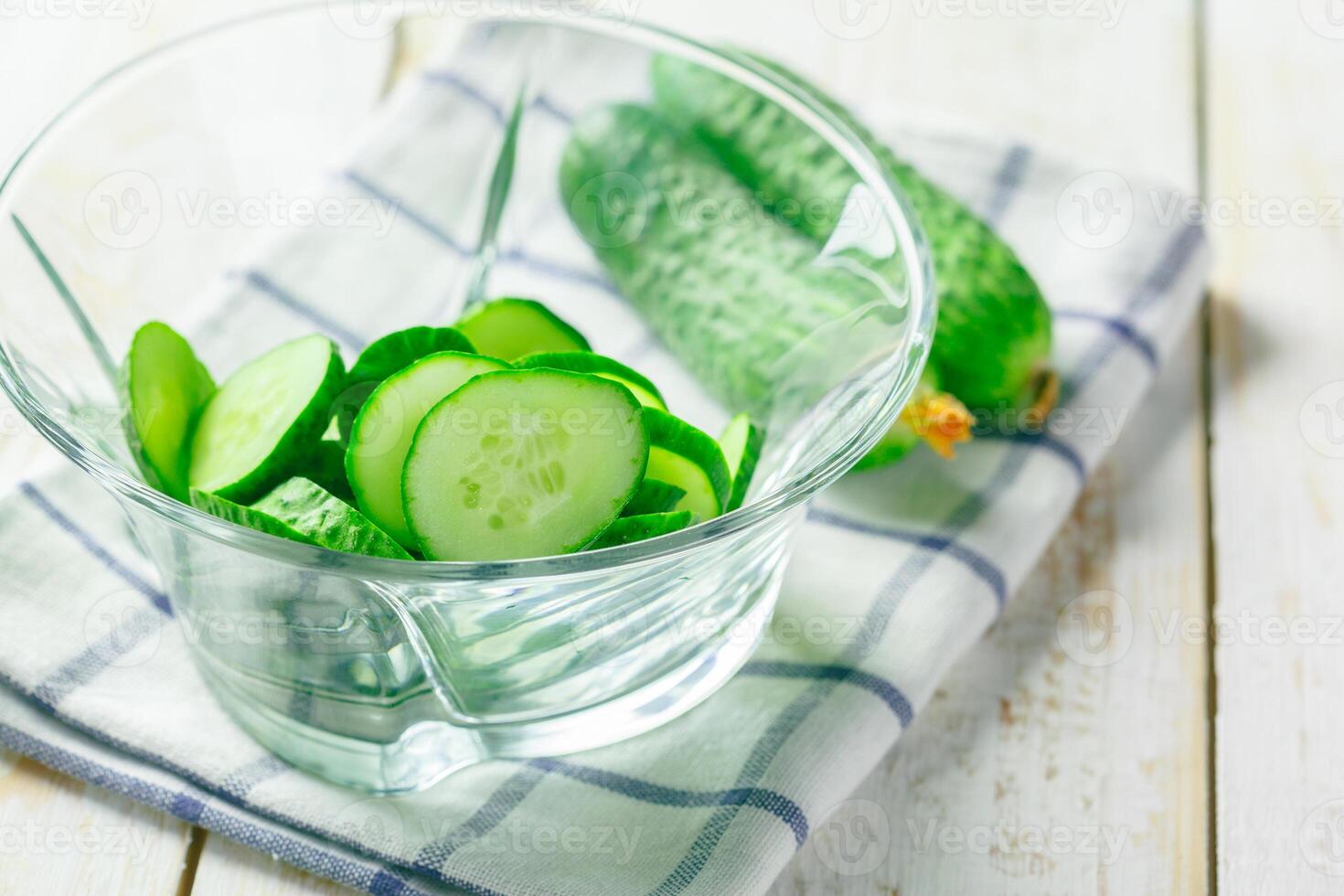 cucumbers on wooden background photo
