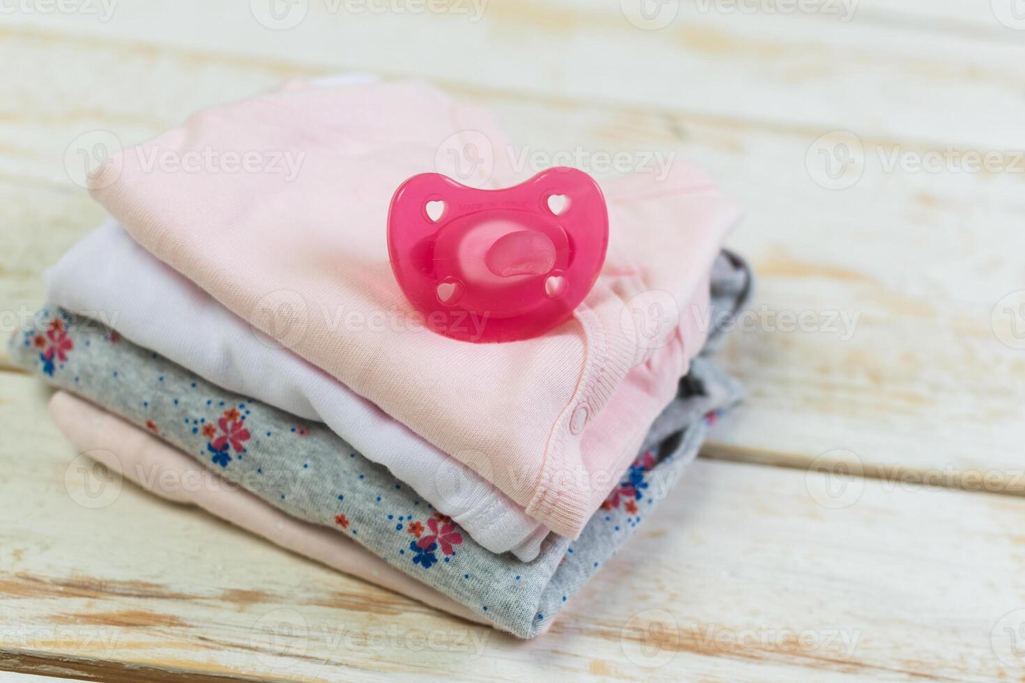 set of fashion trendy clothes and kids stuff for little baby girl photo