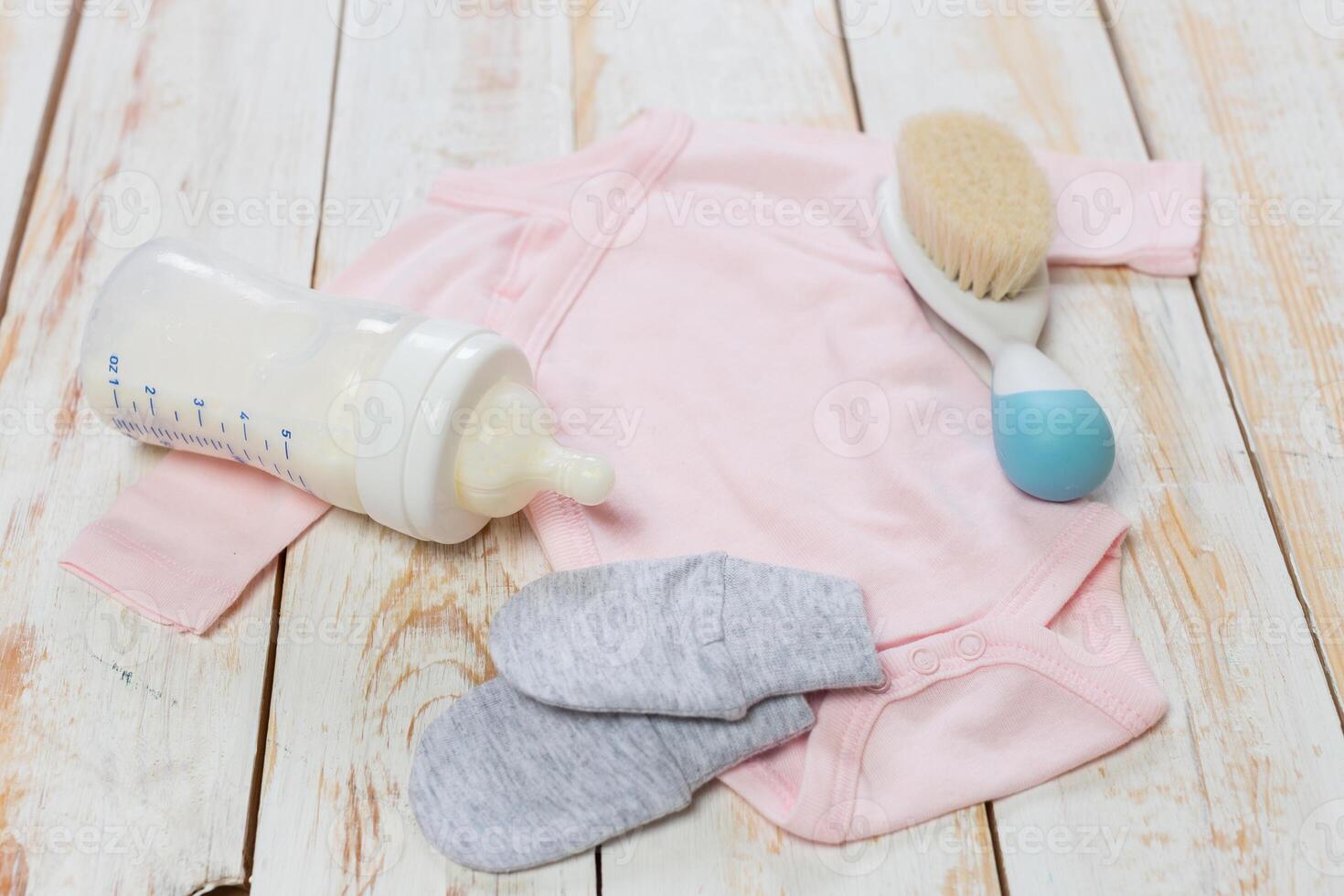 set of fashion trendy clothes and kids stuff for little baby girl photo