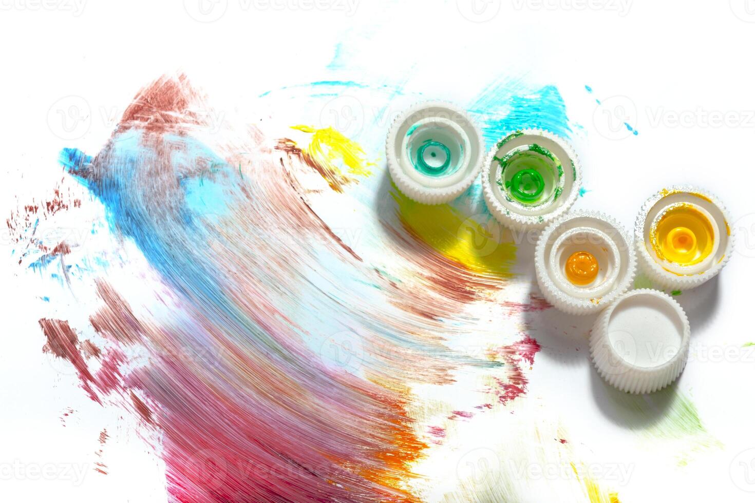 paint in tubes isolated on white photo