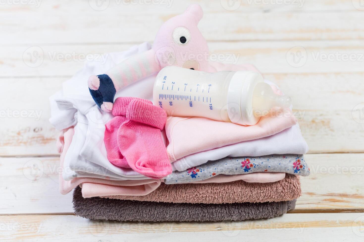 set of fashion trendy clothes and kids stuff for little baby girl photo