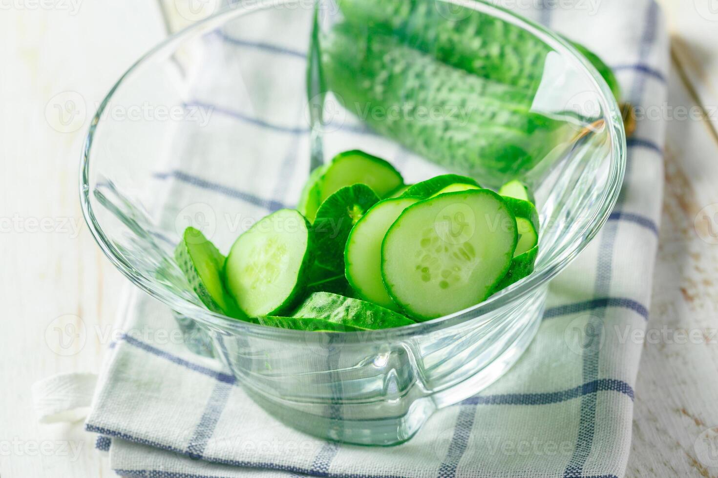 cucumbers on wooden background photo