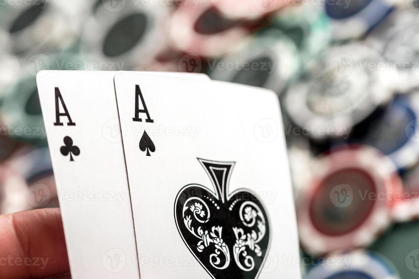 Cards and chips for poker on green table photo